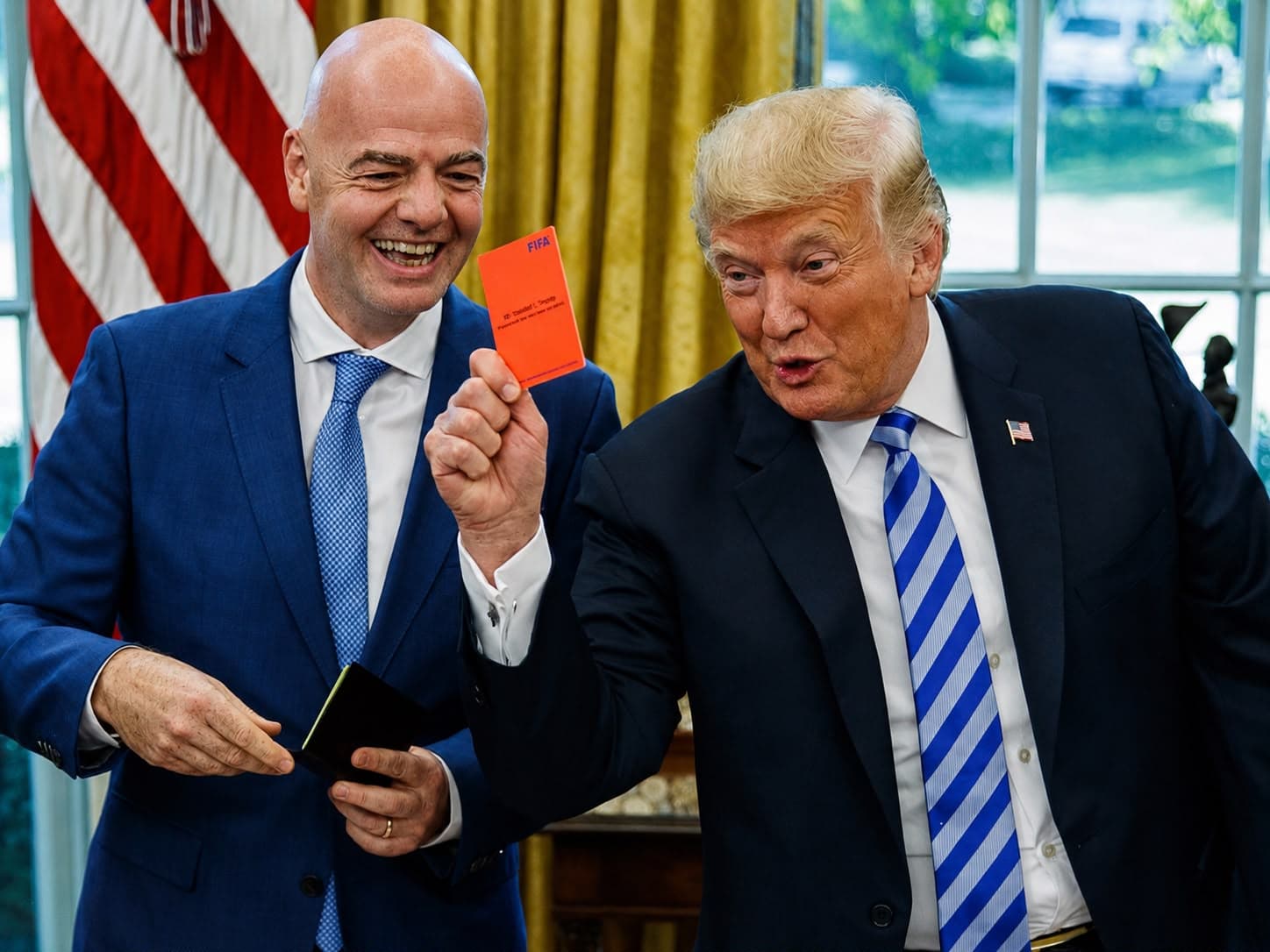 Gianni Infantino and Donald Trump with a FIFA red card